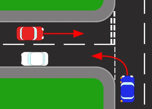 A side road meeting a major road. A red arrow shows the blue car turning left out of the side road, while a red car travels the other way along the major road with a white car waiting behind it.